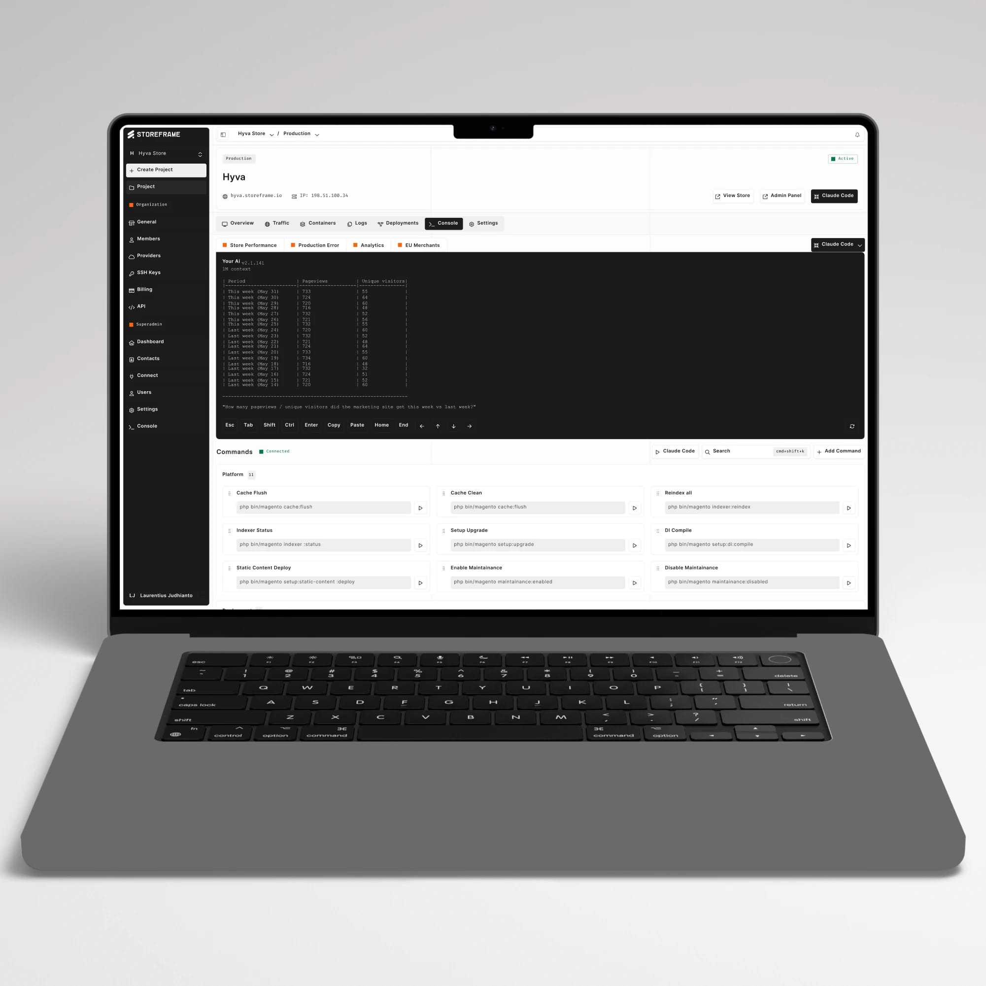 A MacBook showing the StoreFrame HUB dashboard managing a production Magento store — console, deployments, and one-click commands